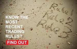 The words rule 1, rule 2, rule 3 written in the sand on a beach, asking if people know the most recent trading rules and inviting them to click a button to find out